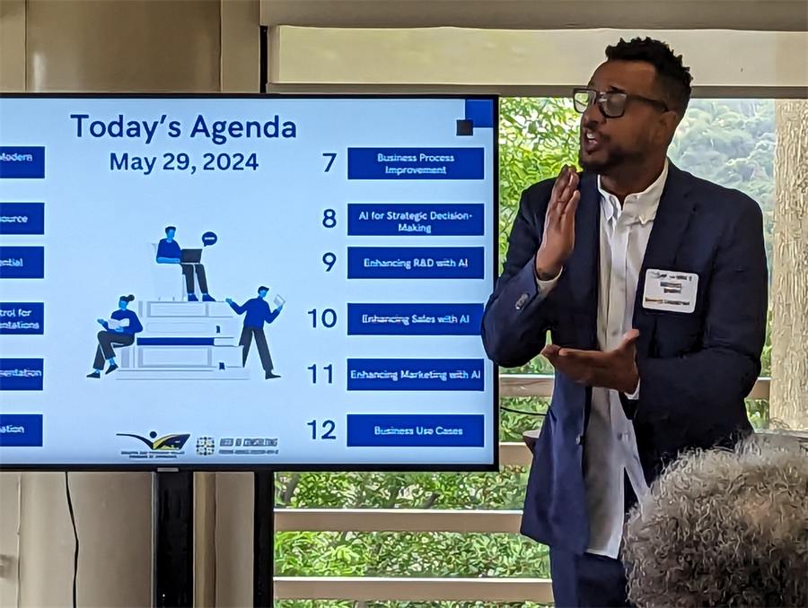 Michael Bowers presenting Business Use Cases to a live audience in May 2024